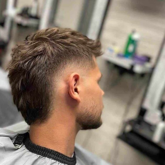 Undercut Blonde Mullet with Disconnected Shape
