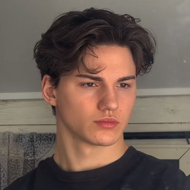 Low Taper Fade Fluffy Hair With Middle Part
